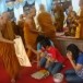 ประเพณีตักบาตรธูปเทียน